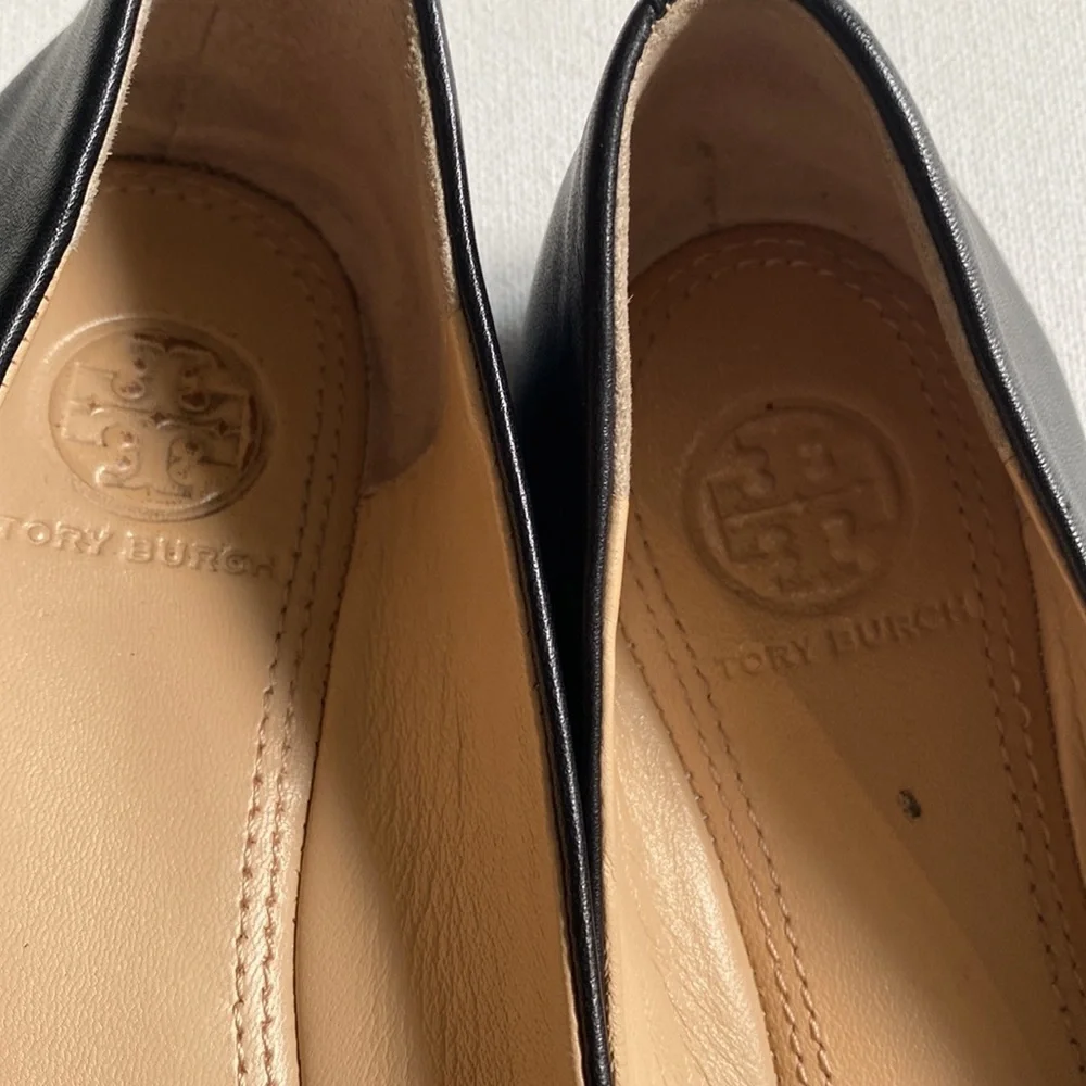 Tory Burch wearing $10